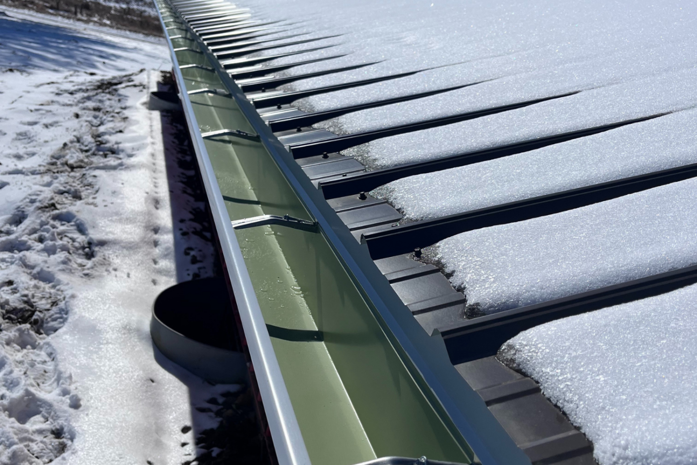 close up view of new gutters on building