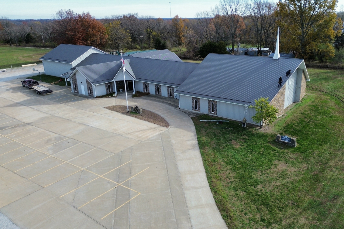 gray and white building with new gutters